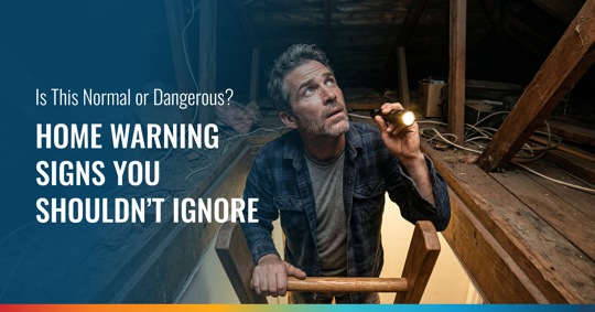 A man with a flashlight looks up into a dimly lit attic. The image features text: Is This Normal or Dangerous? HOME WARNING SIGNS YOU SHOULDN'T IGNORE.