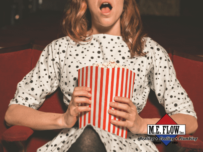 a woman with popcorn