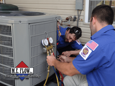 technicians checking HVAC