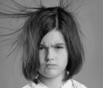 a girl with hair standing