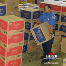 man lifting and moving boxes