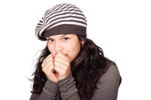 cold woman with striped hat
