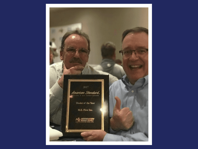 men with an award